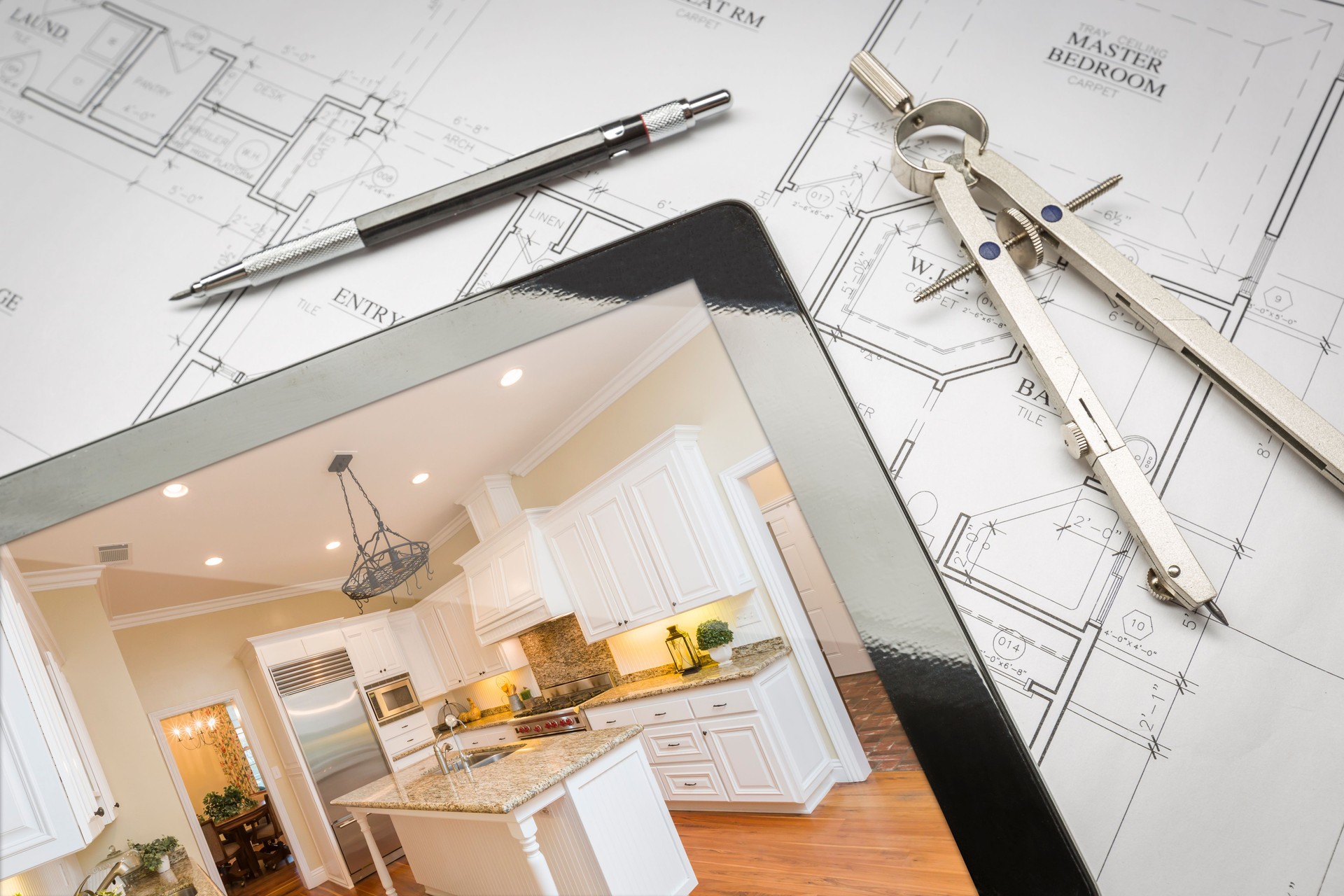 Computer Tablet Showing Finished Kitchen On House Plans, Pencil,